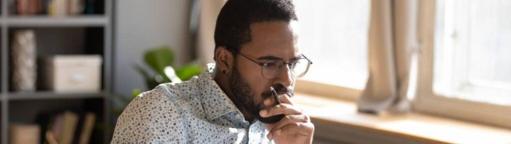 man thinking about food safety compliance and food regulatory software in sydney